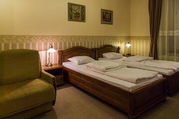 Фото номера Трехместный номер Отель Hotel Staromiejski г. Красныстав 3
